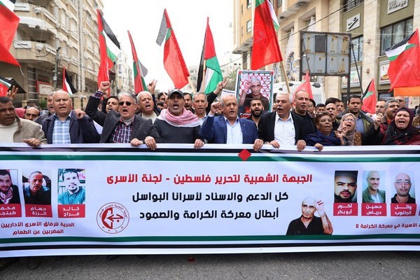 هتاف قادة الشعبية مسيرة أسرى مسيرة الشعبية تضامن مع الأسرى معركة الكرامة.jpg