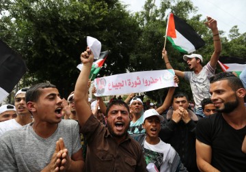 مسيرة لمئات العمال في غزة