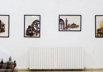 بالصور: فنانة فلسطينية ترسم حكايات شعبها بالقهوة