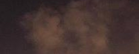 دخان متصاعد من شارع الشهداء