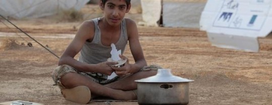 لاجئ سوري في مخيم الزعتري للاجئين السوريين في الأردن