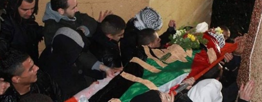 جثمان احد الشهداء الثلاثة