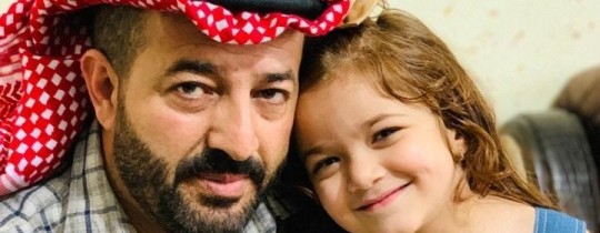 صورة الأسير ماهر الأخرس مع طفلته 