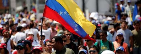 التوصل لاتفاق بين الحكومة الفنزويلية والمُعارضة.. والجيش يُرحّب