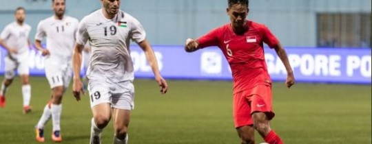 من مباراة فلسطين وسنغافورة