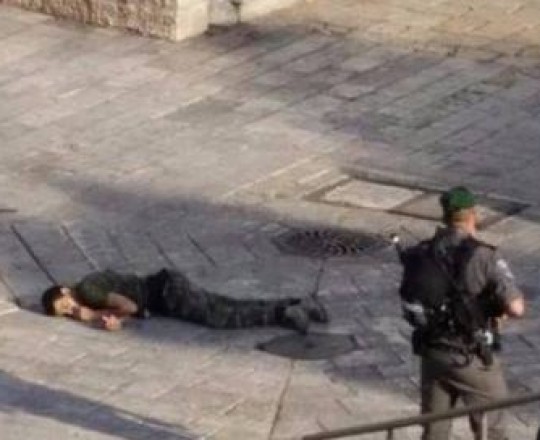 صورة الشهيد الفتى من مكان العملية بمدينة القدس