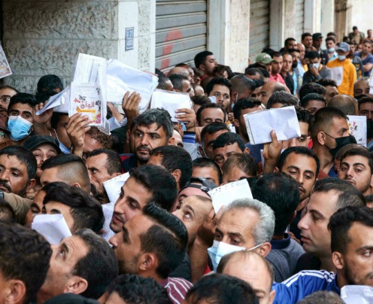 عمال في غزة 