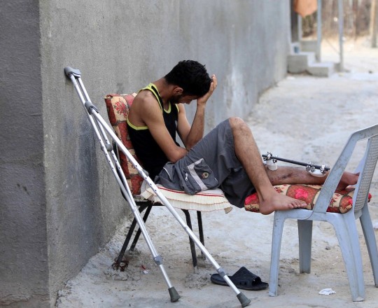 أحد جرحى مسيرات العودة في غزة - وكالات