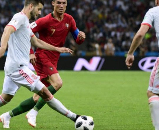 © أ ف ب | المنتخب البرتغالي يتعادل أمام نظيره الإسباني 3-3 على ملعب سوتشي 15 حزيران/يونيو 2018.