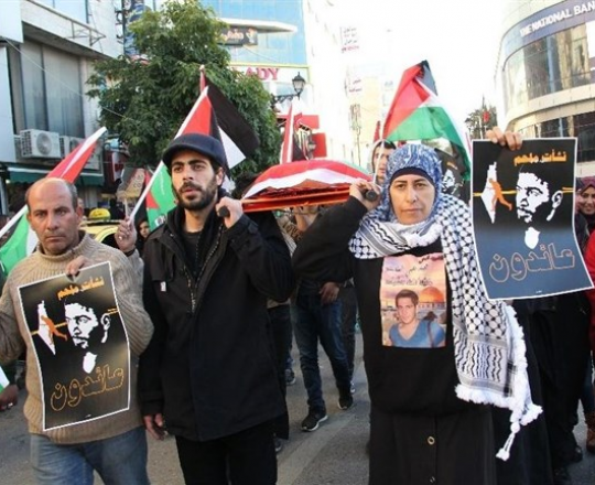 جنازة رمزية للشهيد نشأت ملحم