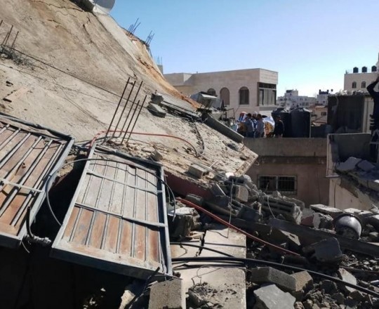 صورة لمنزل العائلة بعد هدمه في يوليو 2018 - وكالات