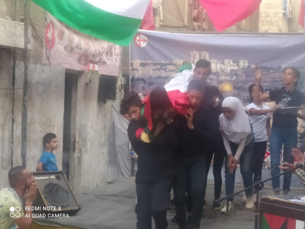 الشعبيّة بمُخيّم جرمانا تنظم حفلاً لتخريج النادي الصيفي سيف القدس (5).jpg